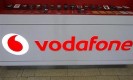 The Vodafone logo is seen at the counter of the shop in Prague